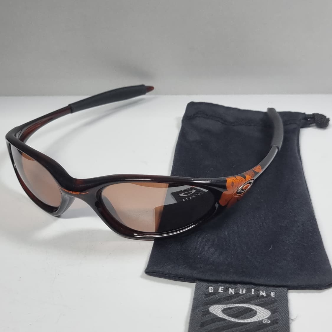 오클리 미뉴트 1.0 플라워에디션 텐저린 상품이미지1