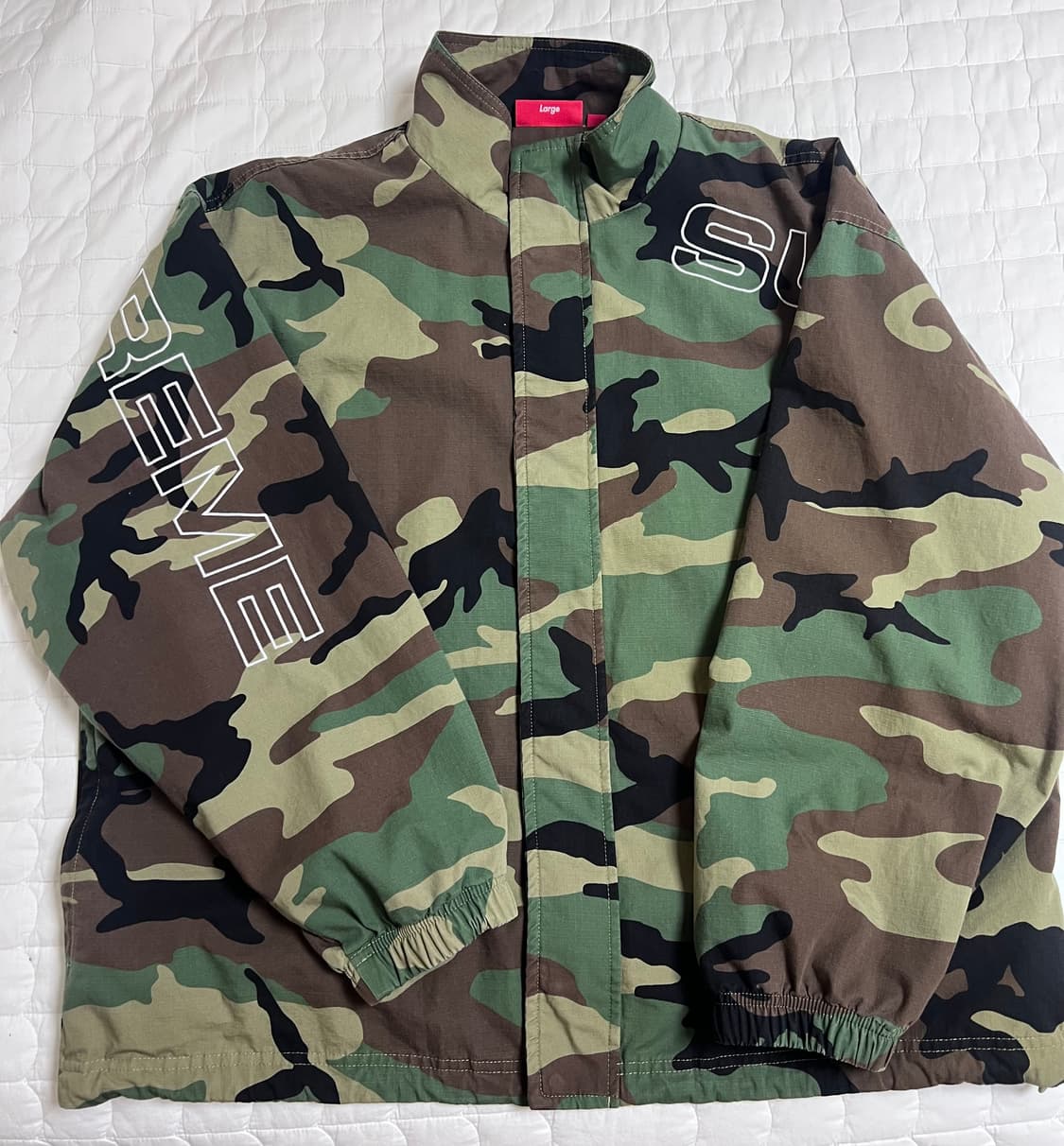 [L] 25FW 슈프림 스펠아웃 립스탑 트랙자켓 우드랜드 카모 상품이미지2