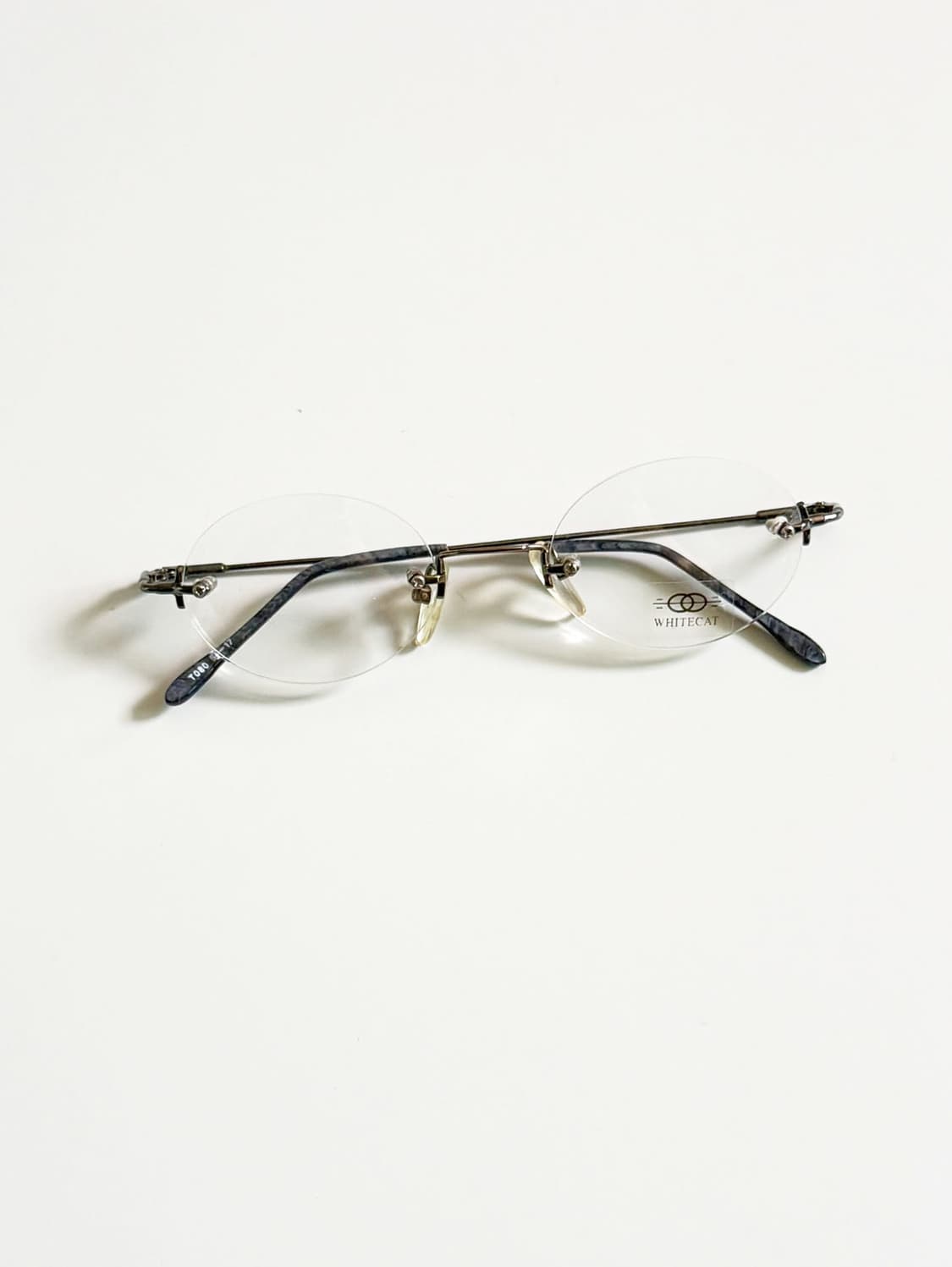90s WHITE CAT 무테 오벌 메탈 프레임 빈티지 안경 상품이미지1