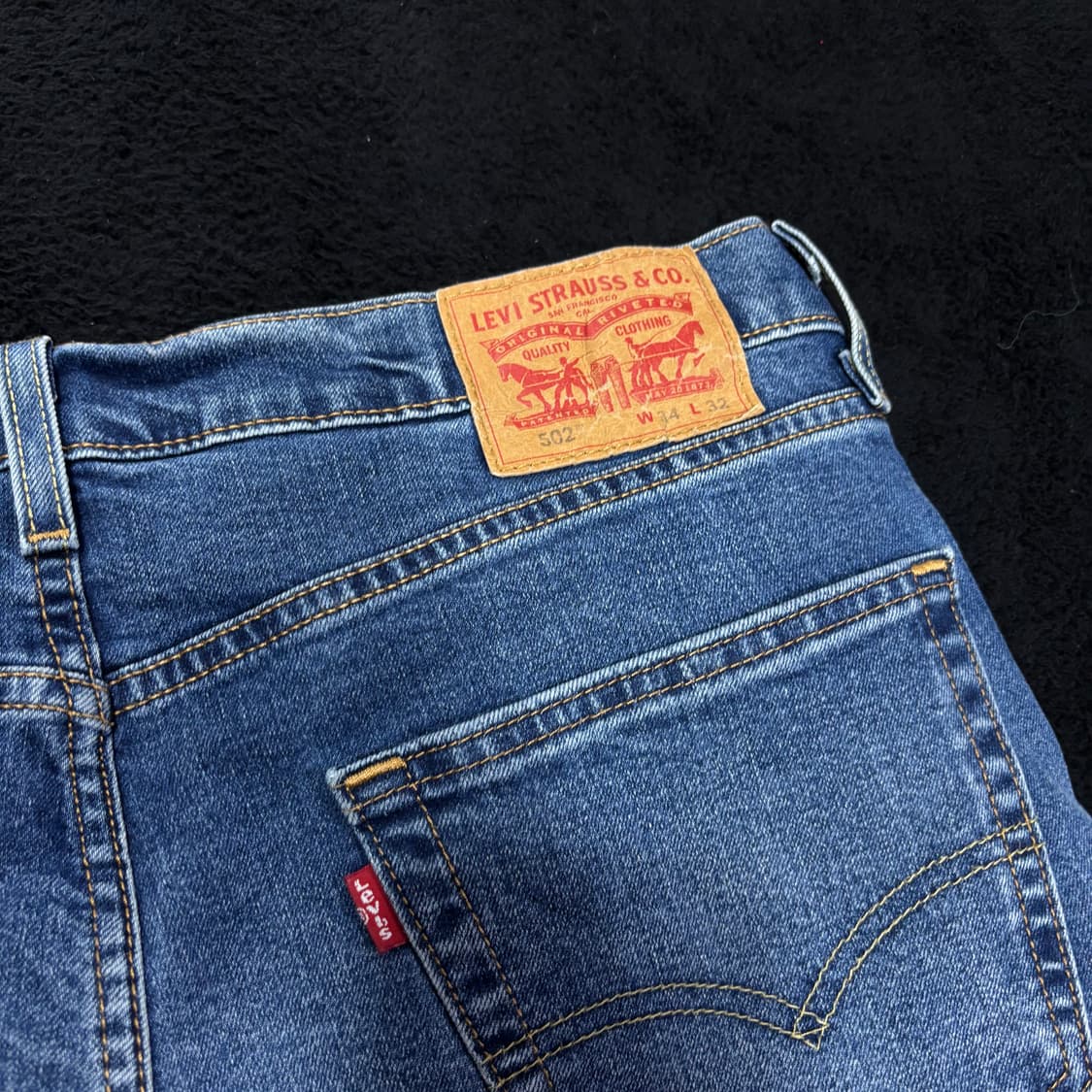34 리바이스502 중청 워싱 테이퍼드 데님팬츠 상품이미지4