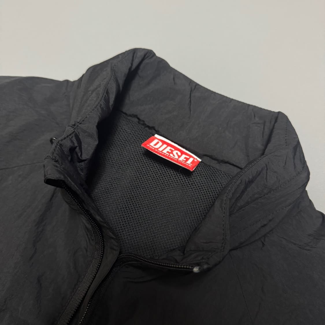 디젤 DSL55 블랙컬러 스포츠 칼라넥 후드 2way 나일론 윈드브레이커 상품이미지3