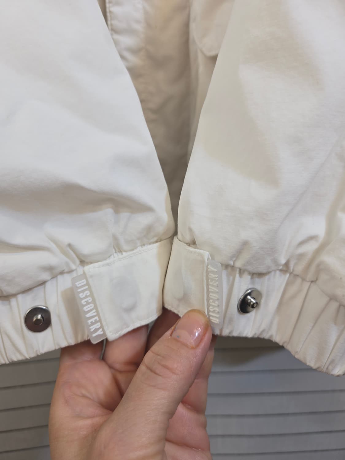 디스커버리 익스페디션 화이트 바람막이 자켓 상품이미지5