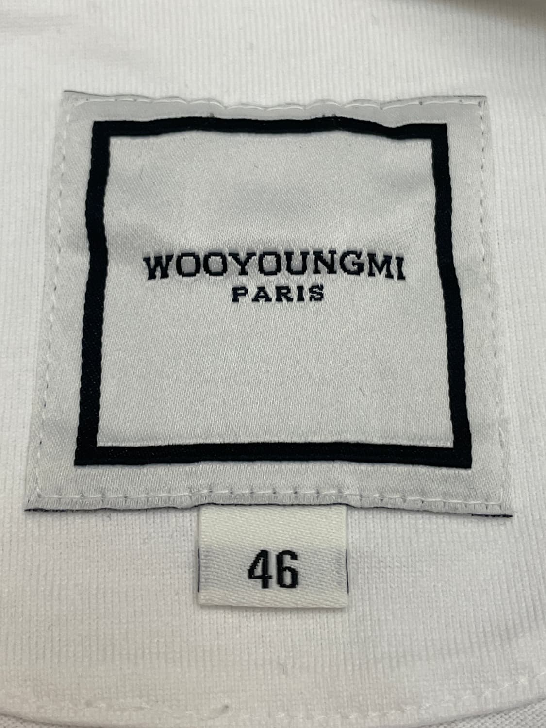 우영미 코튼 백로고 롱슬리브 티셔츠 화이트 23FW 상품이미지6