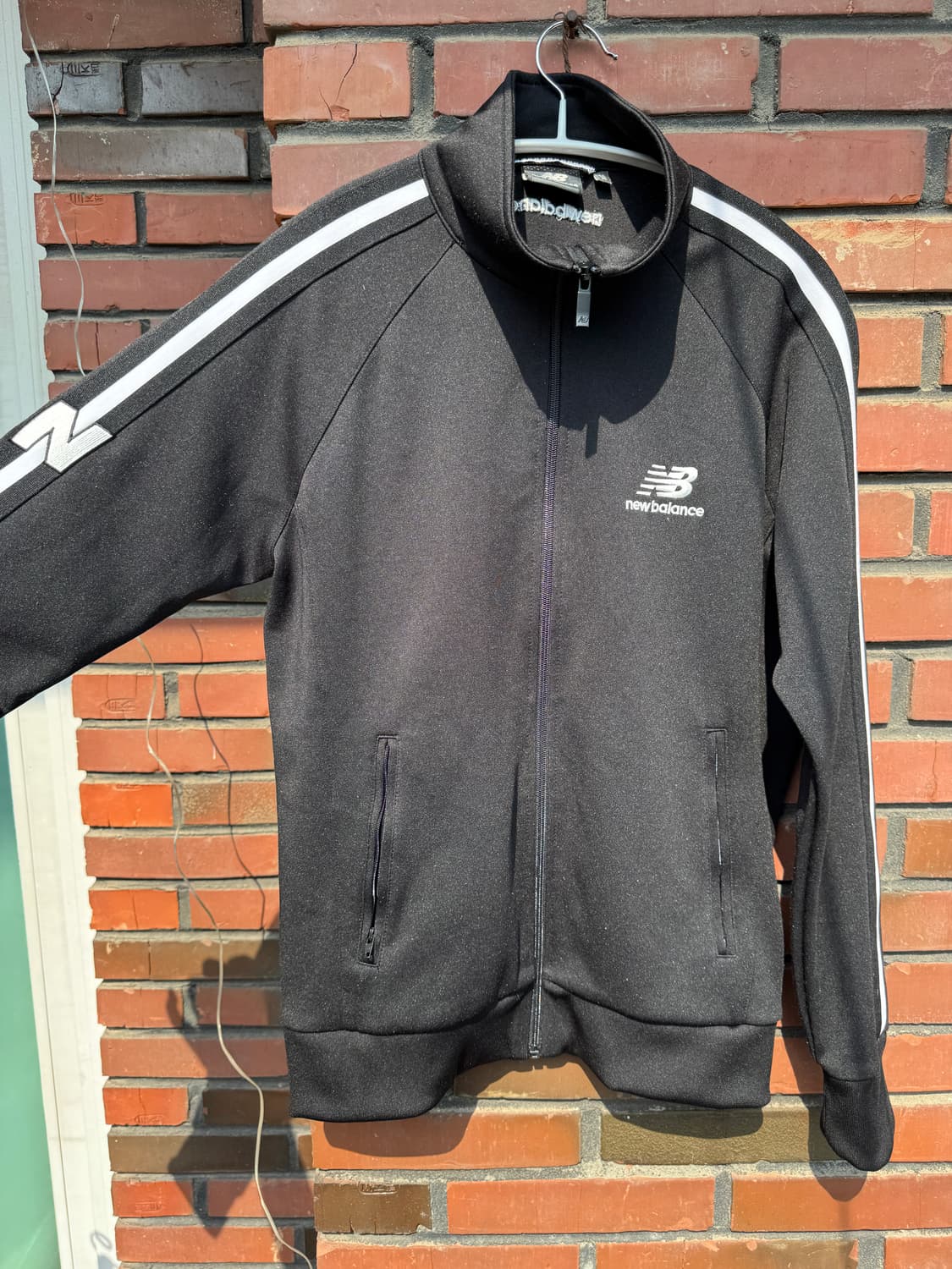 뉴발란스 블랙 져지 트랙탑 M 상품이미지1