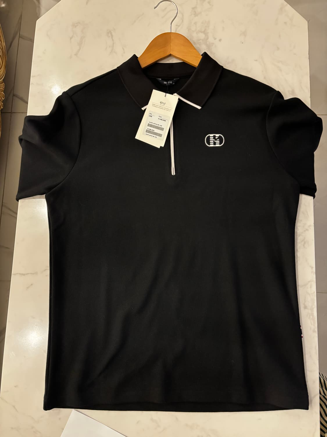 헤지스 골프 블랙 반집업 카라티 100 상품이미지1