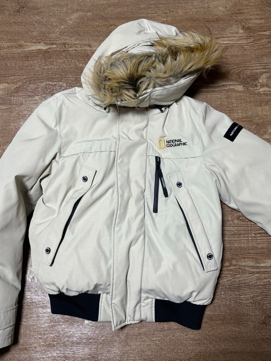 내셔널지오그래픽 패딩 95사이즈 베이지 상품이미지1