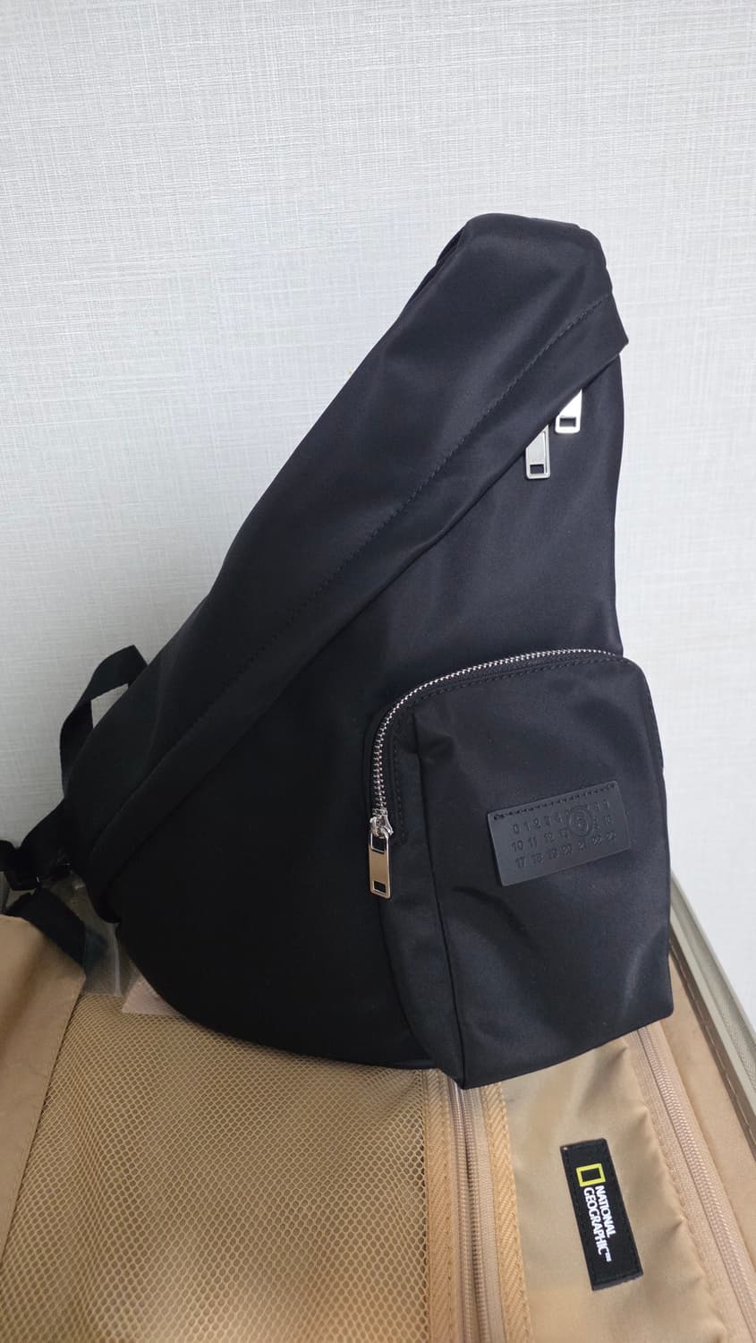 메종 마르지엘라 트라이앵글백 상품이미지1