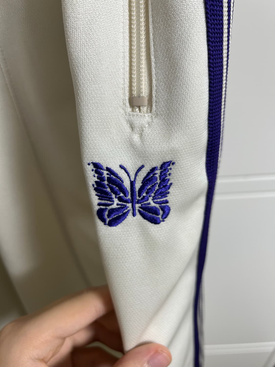 니들스 hd 트랙팬츠 폴리 스무스 아이스 화이트 (화이트 퍼플) 상품이미지3