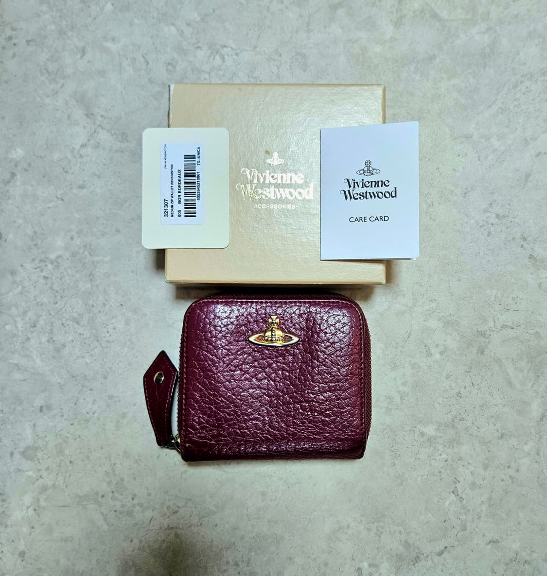 비비안 웨스트우드 지퍼포켓 반지갑 상품이미지1