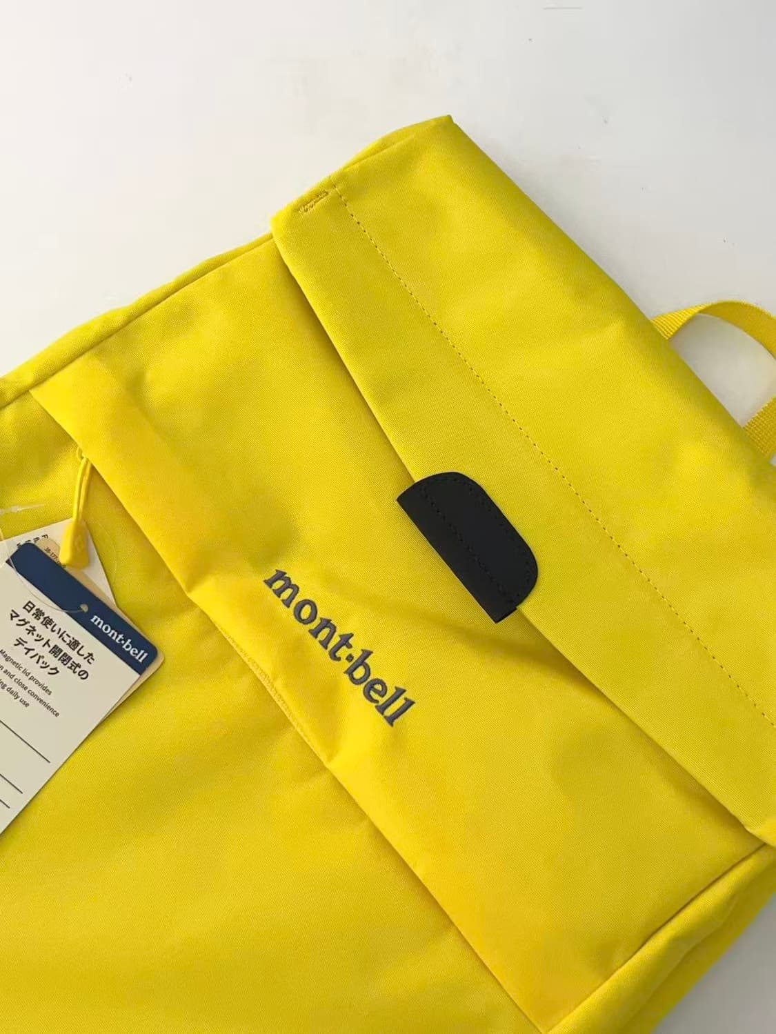 (새상품)몽벨 롤 탑 플랩팩 15 백팩 옐로우 상품이미지3