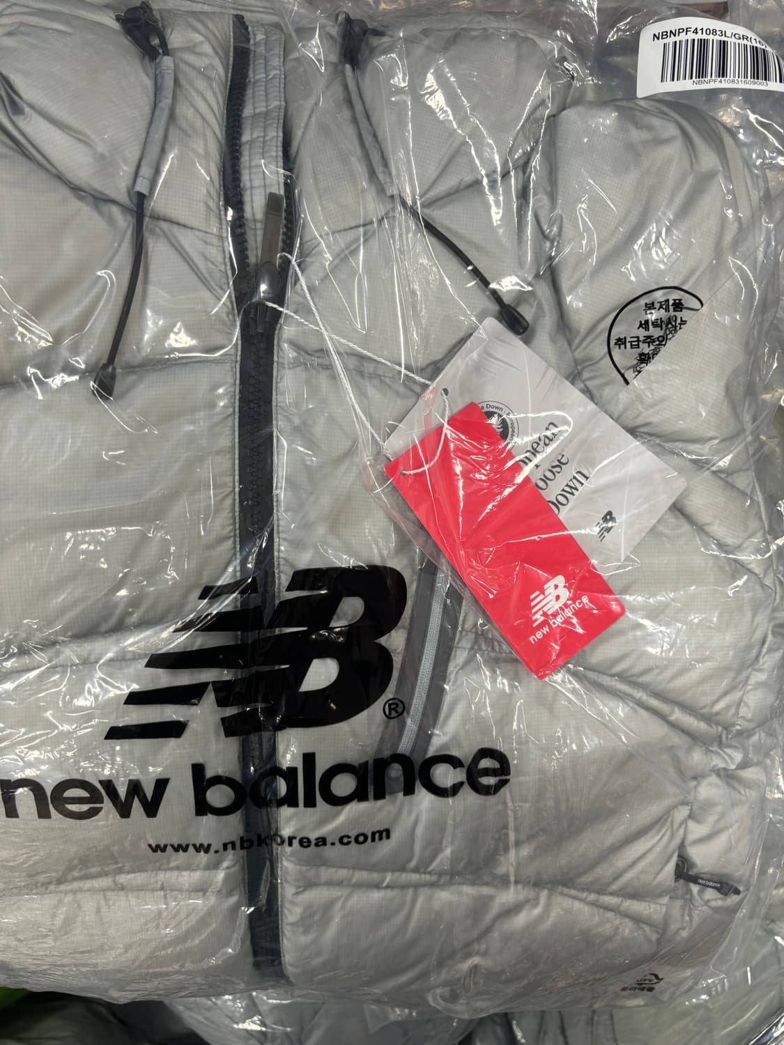 S 뉴발란스 플라잉77 슈퍼라이트 헤비 구스다운 라이트 그레이 판매 상품이미지1