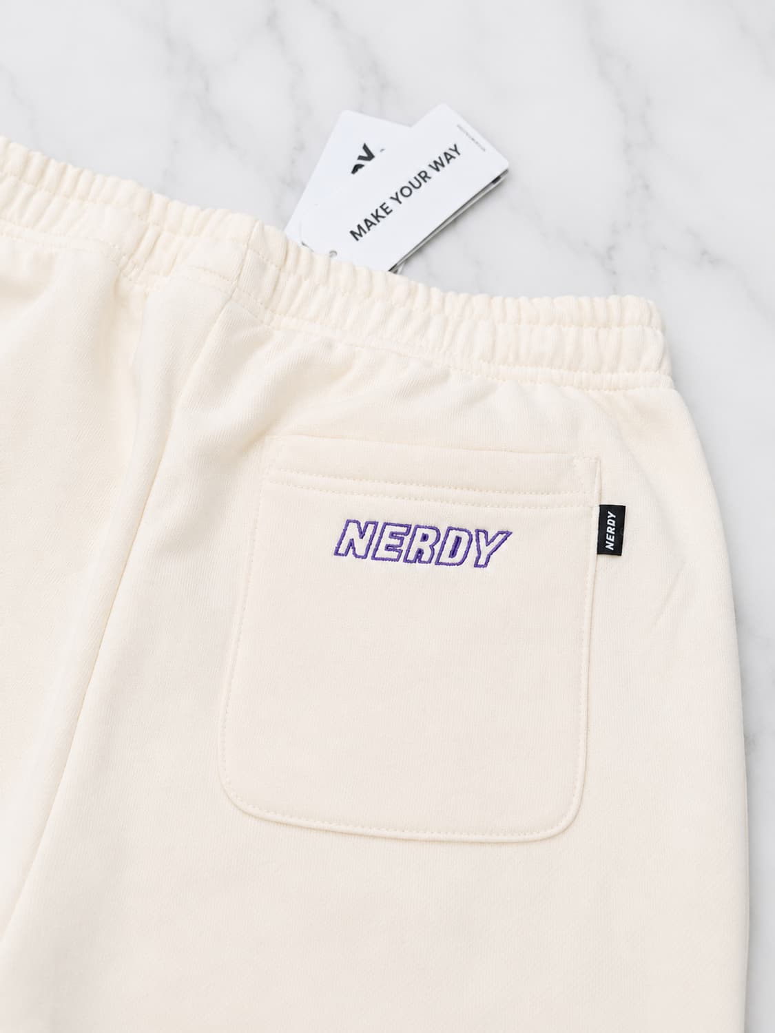 널디 NERDY 로고 테이프 스웨트팬츠 크림 S  상품이미지7