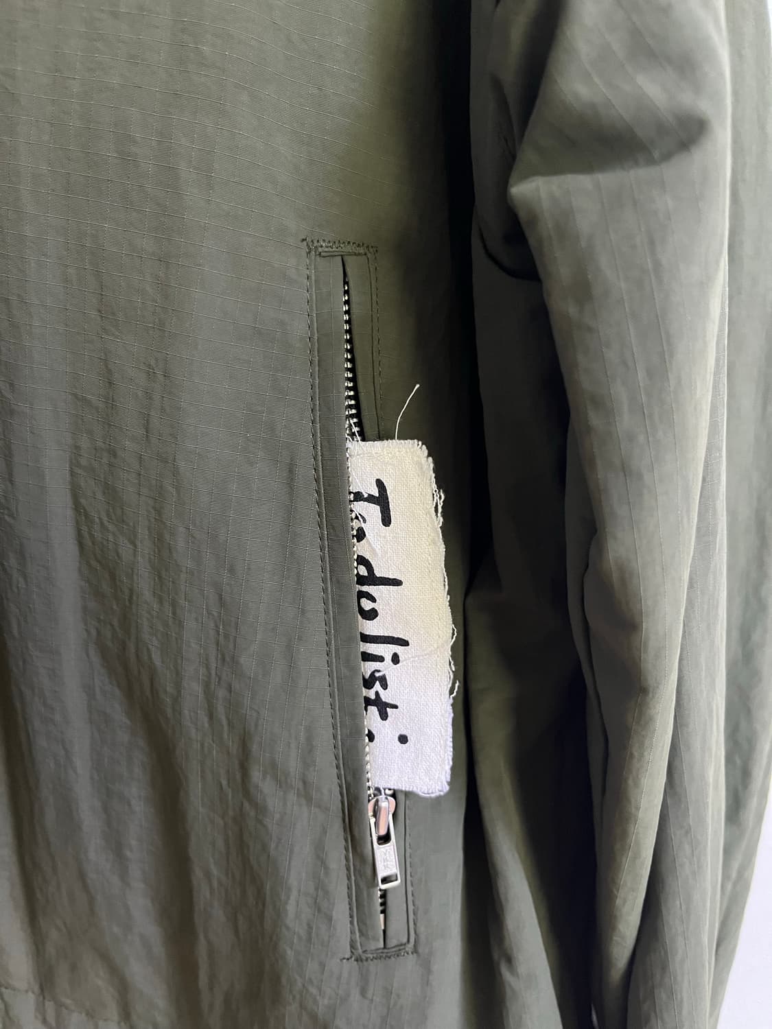 STU 레터링 윈드브레이커 카키 L 상품이미지4