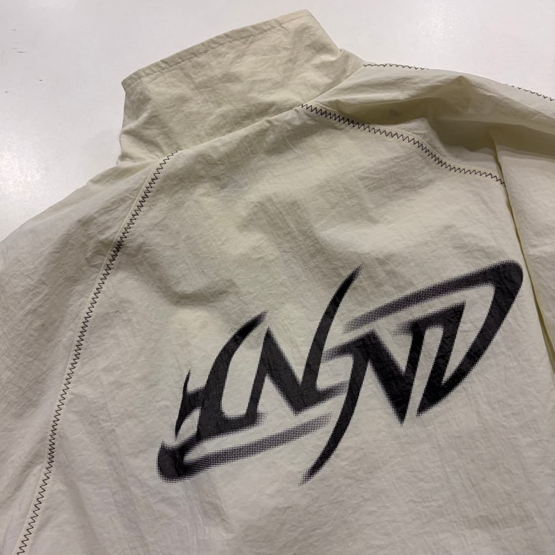 [L] 낫포너드 빅로고 아이보리색 바람막이 점퍼 B478 상품이미지10