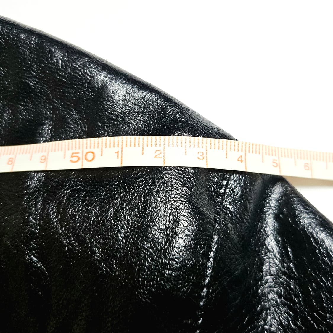 [88(66)][한섬 시스템SYSTEM] 페이크 레더 텍스트 블록 점퍼 상품이미지8