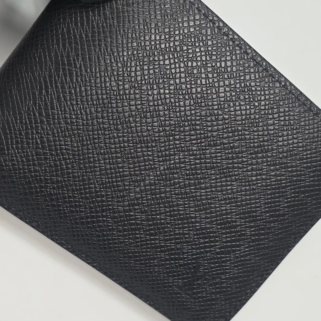 루이비통 멀티플 월렛 타이가 반지갑 상품이미지10