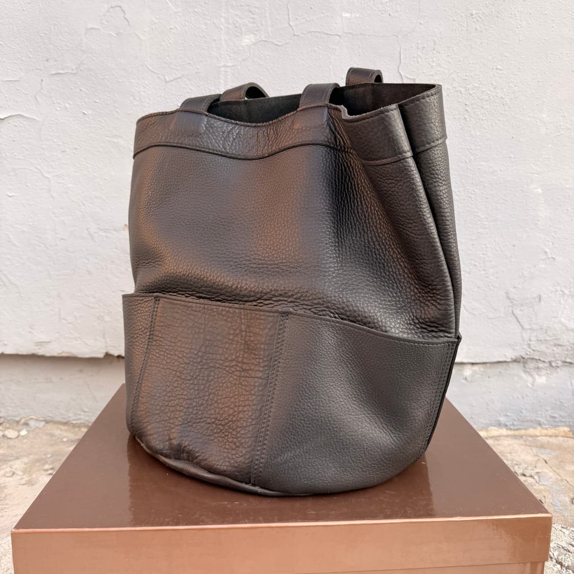 꼼데가르송 레더 실린더 토트백 상품이미지1