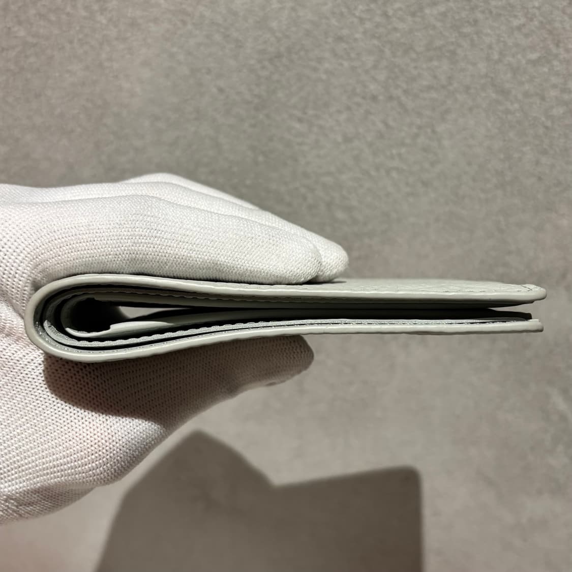 루이비통 토뤼옹 반지갑 상품이미지6