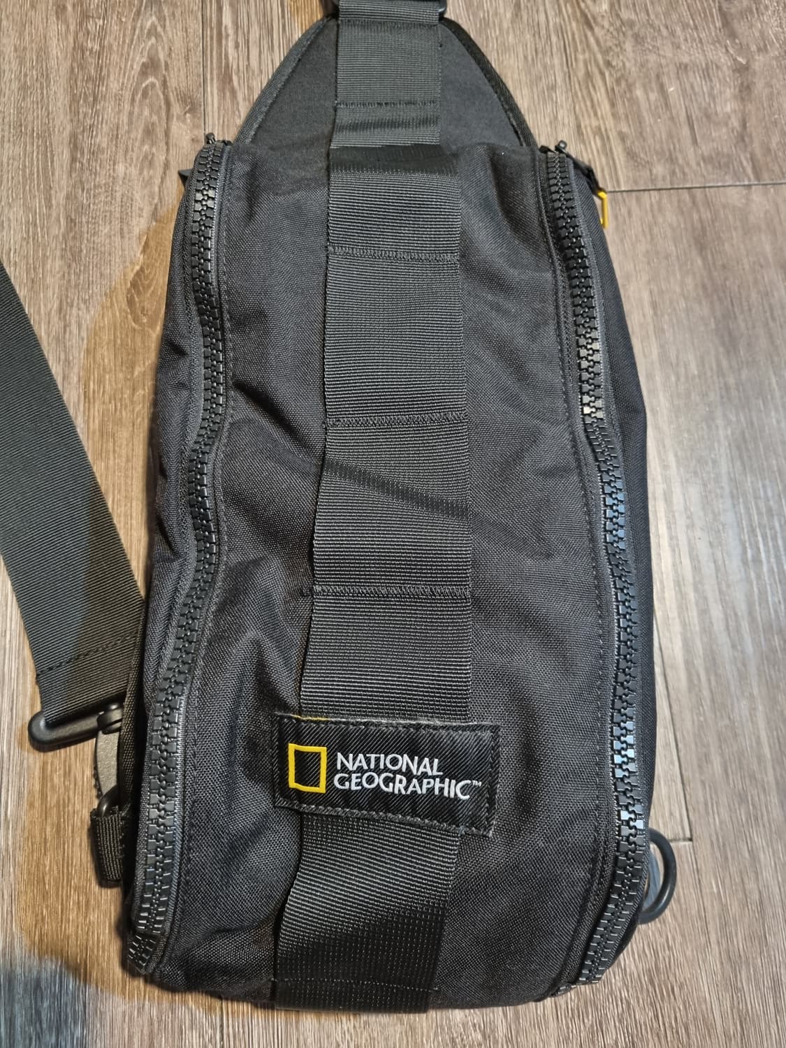 내셔널지오그래픽 블랙 슬링백 상품이미지1