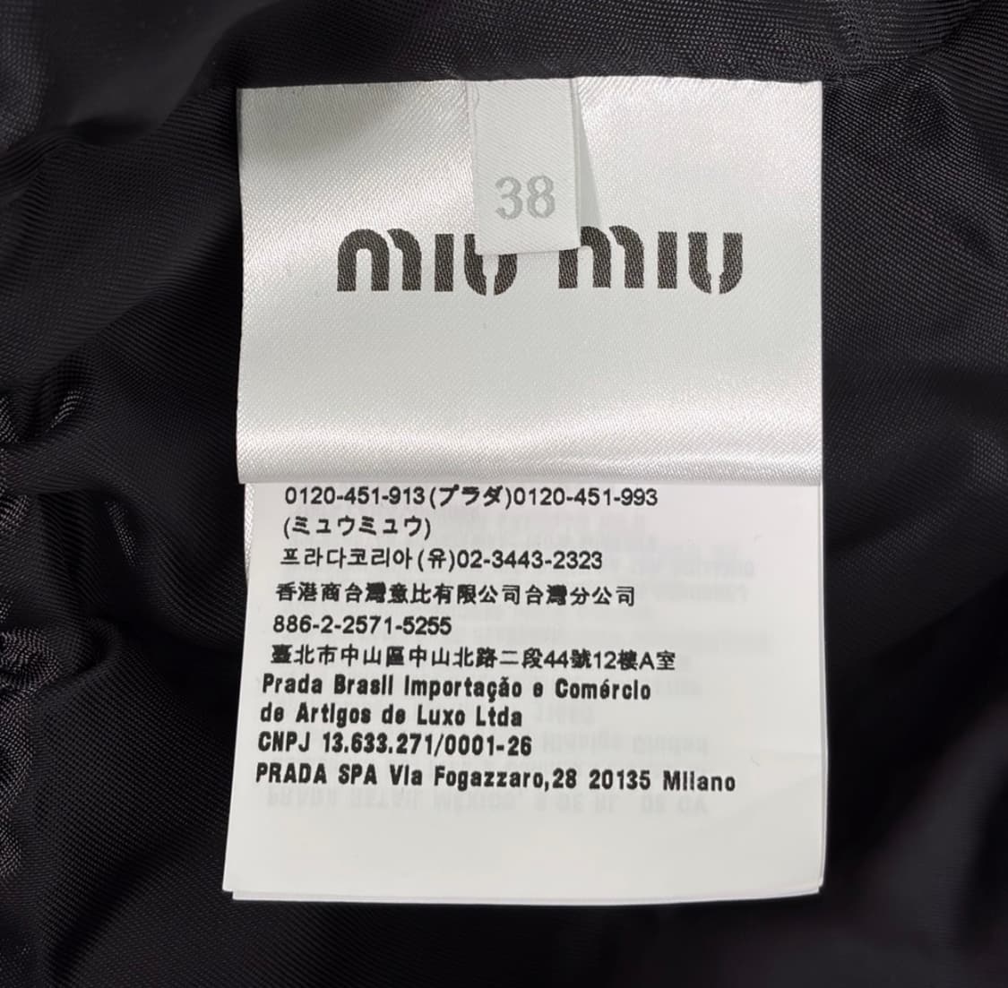 [38] 미우미우 24ss 여성 크롭 바타비아 봄버 바시티 자켓 네이비 상품이미지8