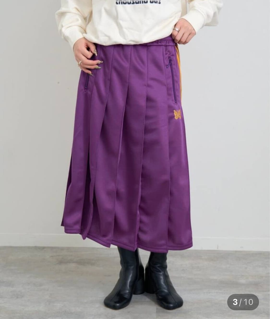 니들스 트랙스커트 상품이미지1