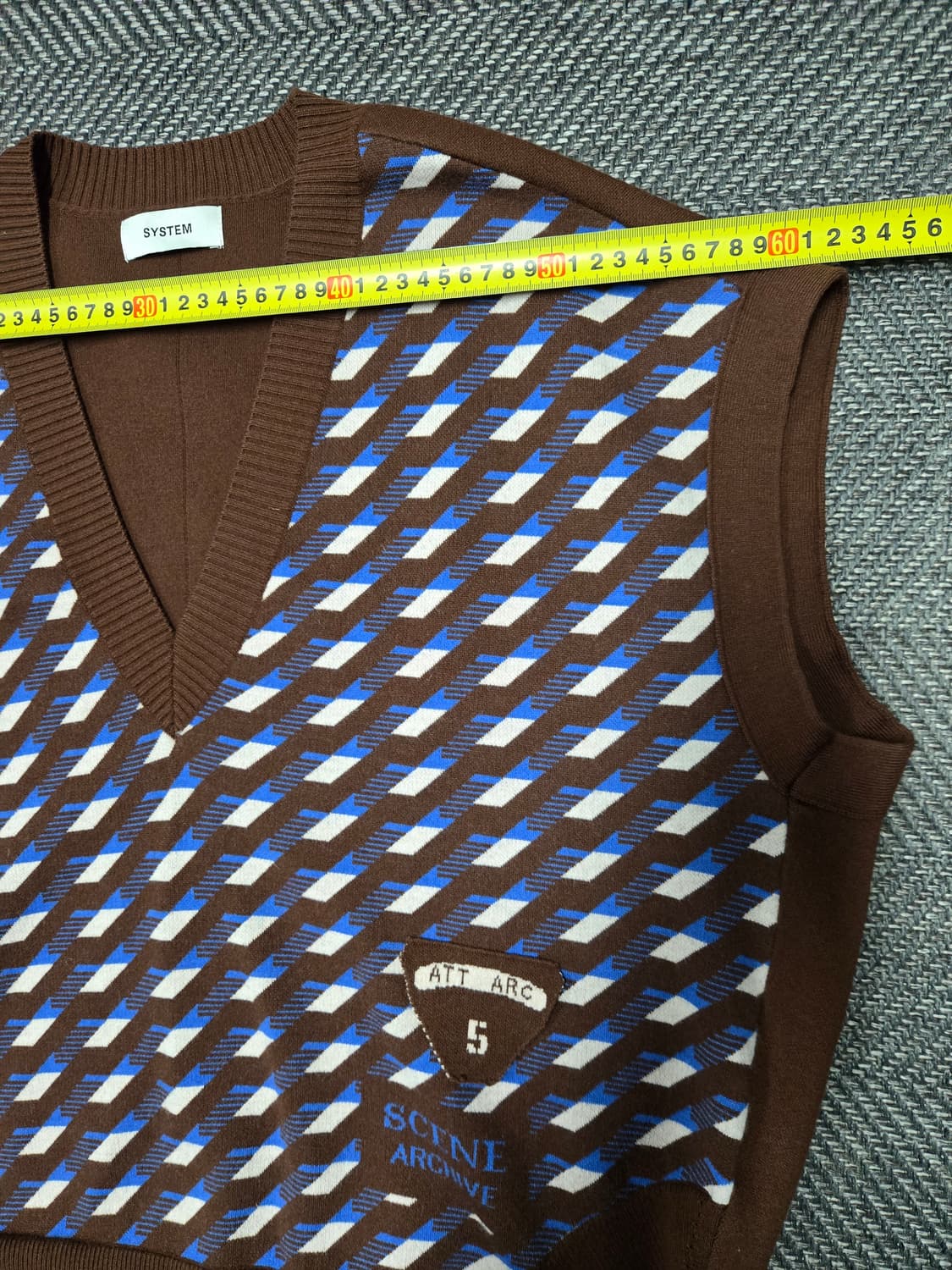 한섬 시스템 22ssSYSTEM 브랜드의 브라운 컬러 패턴 니트 베스트 상품이미지6