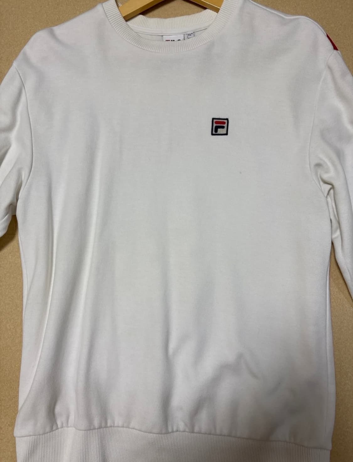 휠라 백 로고 맨투맨 상품이미지1