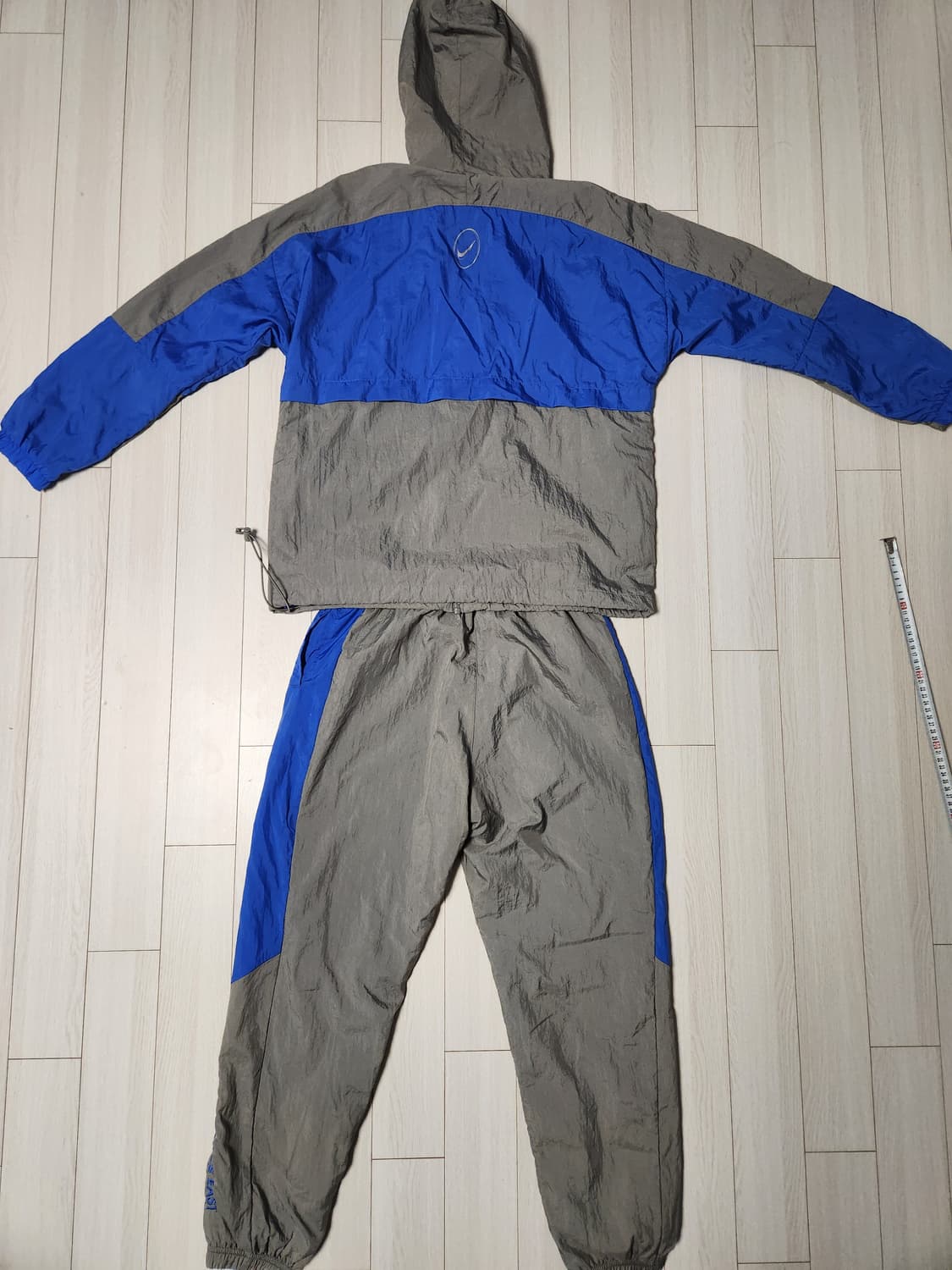 나이키 애슬레틱스 우븐 후드집업 바람막이 상하의 세트 사이즈95 m

여 상품이미지10