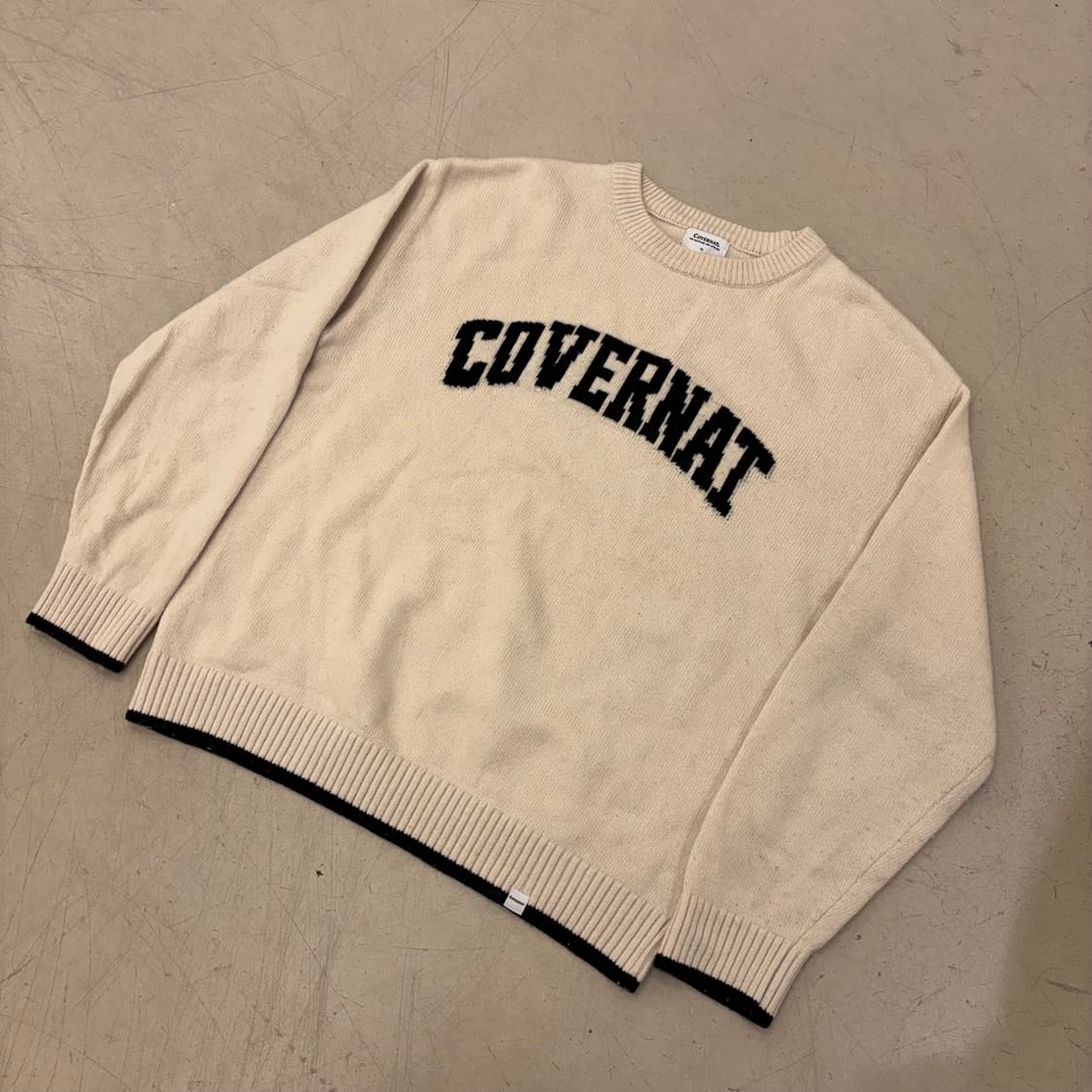 커버낫 아치로고 아이보리 니트 상품이미지1