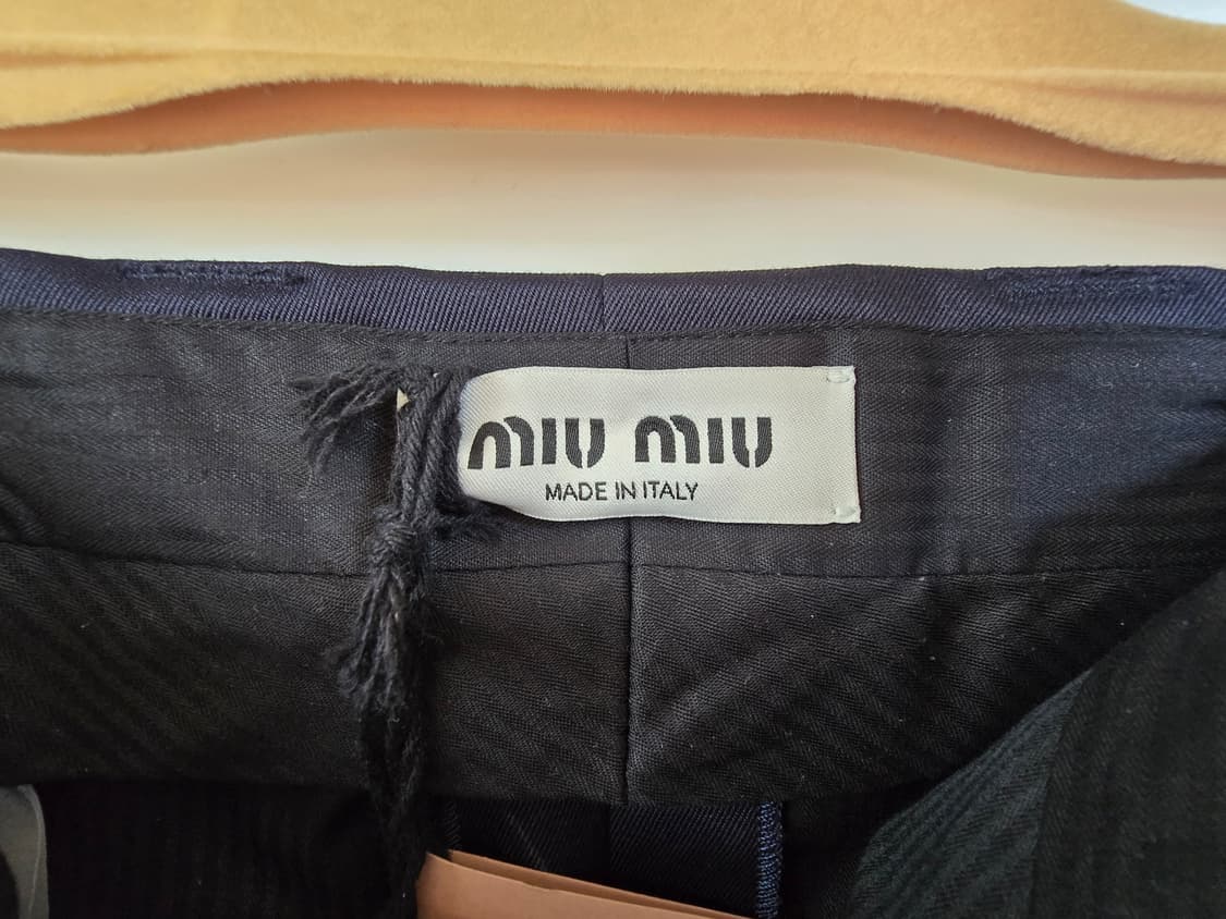 새제품] 미우미우 플리츠 로우라이즈 미니 스커트 22SS 상품이미지6