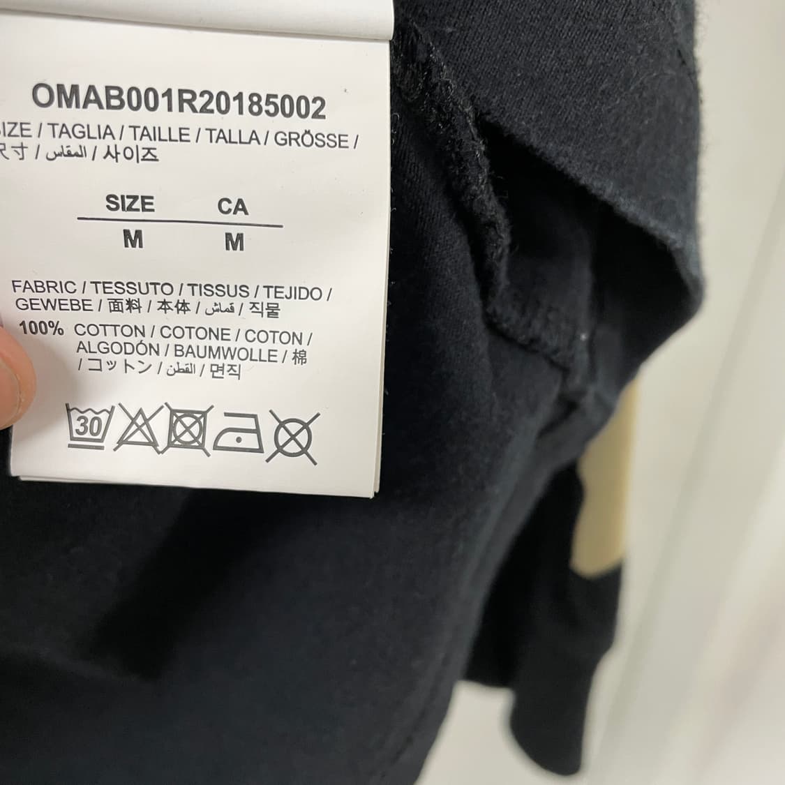 오프화이트 긴팔 티셔츠 M 상품이미지4