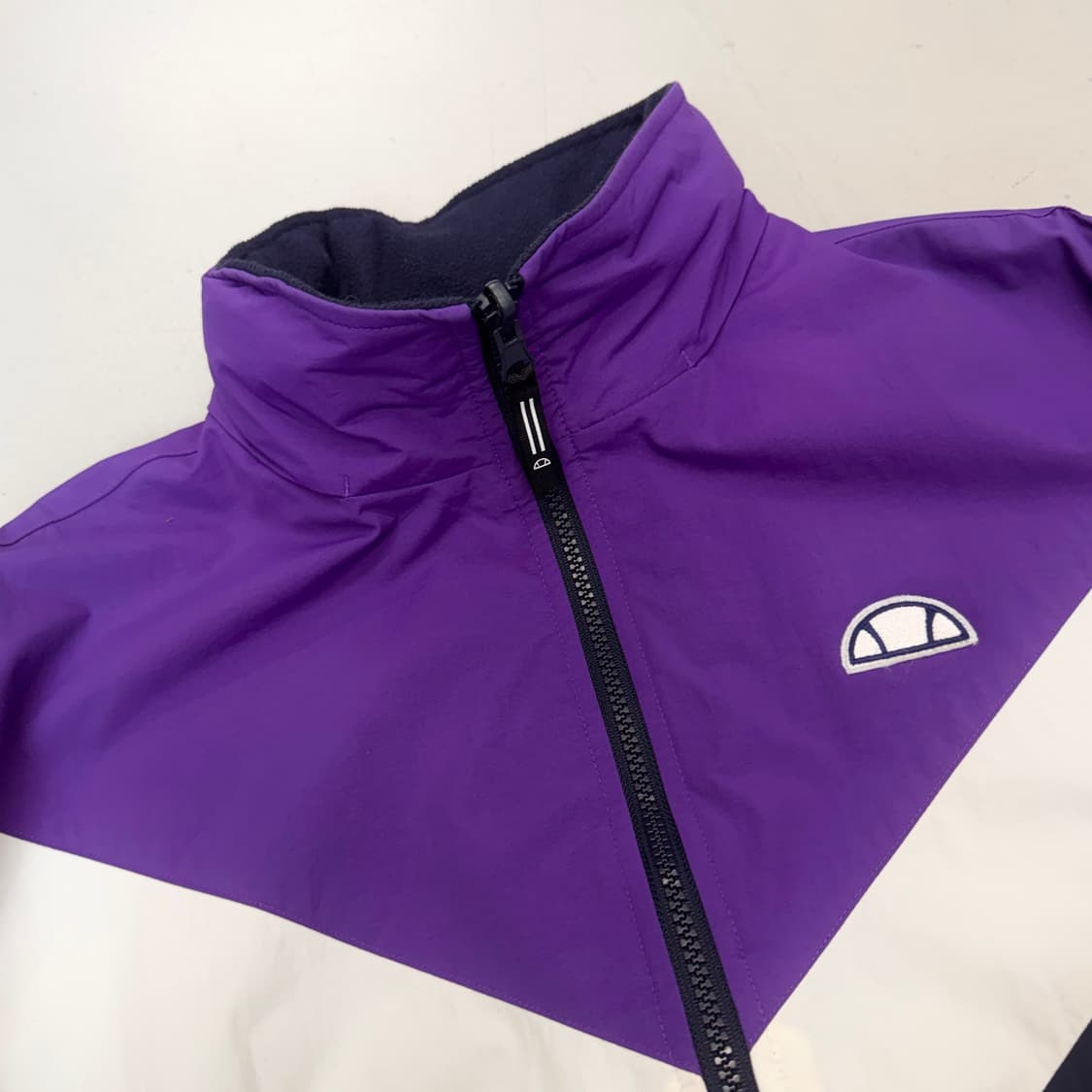 엘레쎄 리버시블 올드스쿨 플리스 바람막이 자켓 상품이미지5