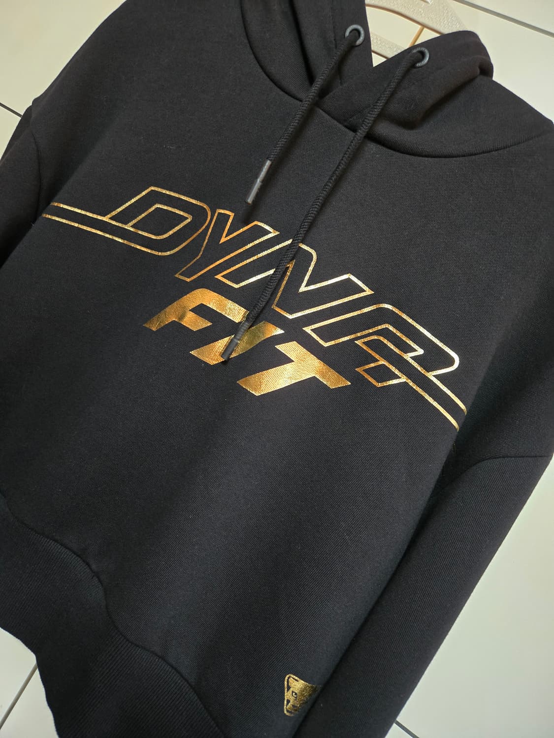 다이나핏 여성 블랙 크롭 후드티 상품이미지2