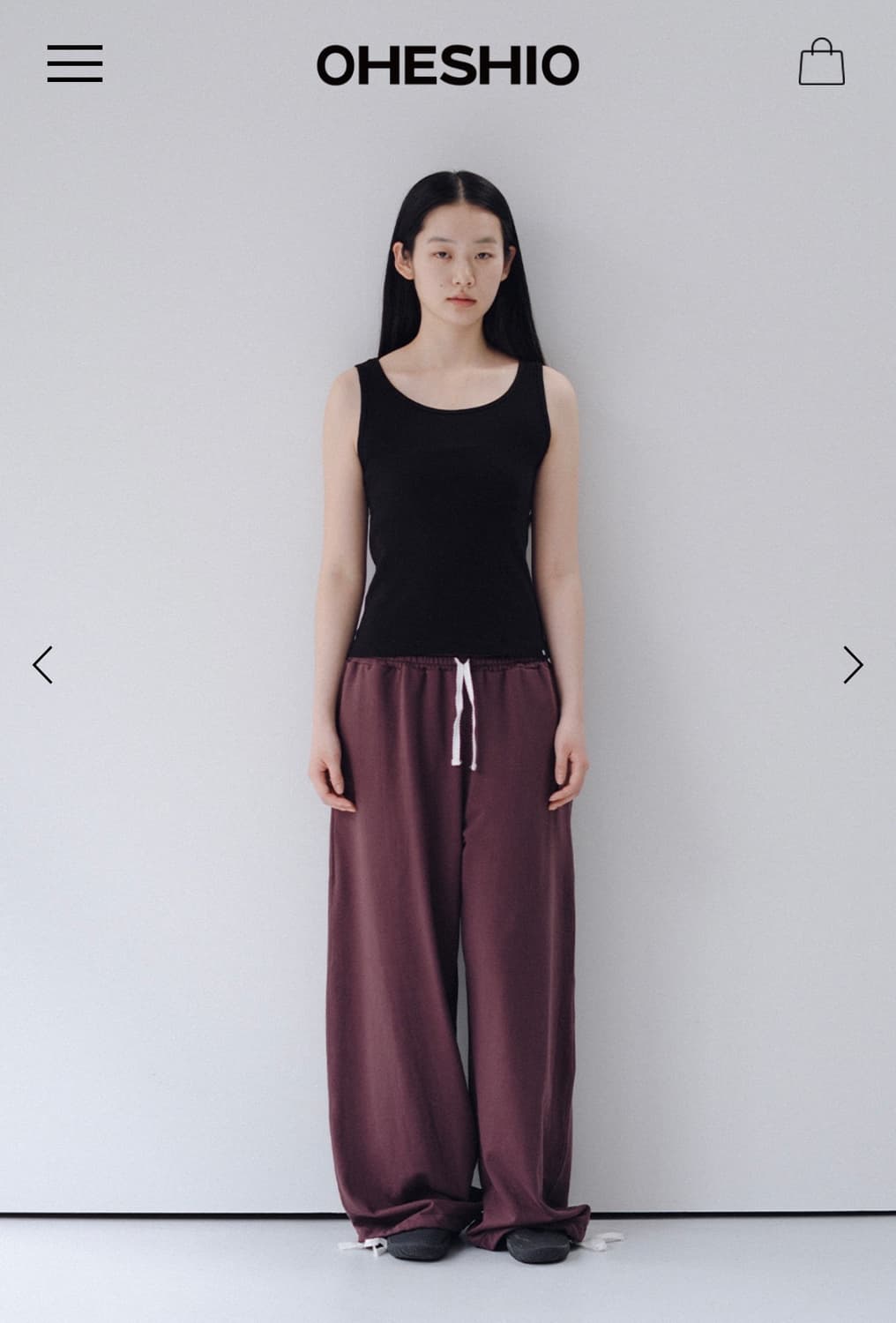 새상품 오헤시오 베이직 유넥 슬리브리스 블랙 상품이미지1