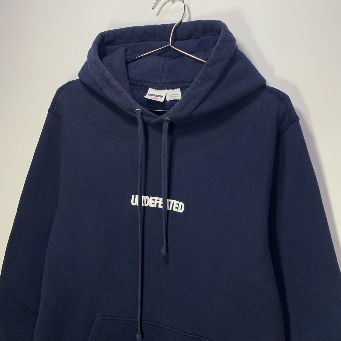언디피티드 네이비 후드티 상품이미지1