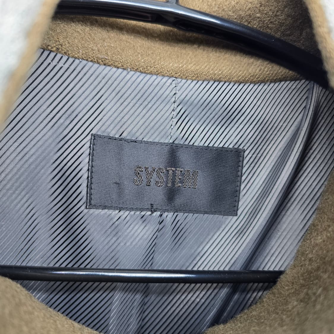 넥 부분이 올라오는 한섬 브랜드 SYSTEM 울 코트 상품이미지2