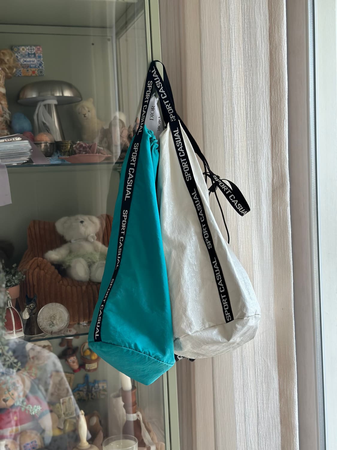 헤리티지플로스 페이턴트 스포츠백 화이트 상품이미지1