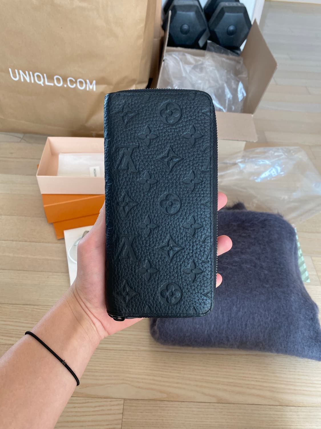 루이비통 토뤼옹 모노그램 지퍼 장지갑 상품이미지1