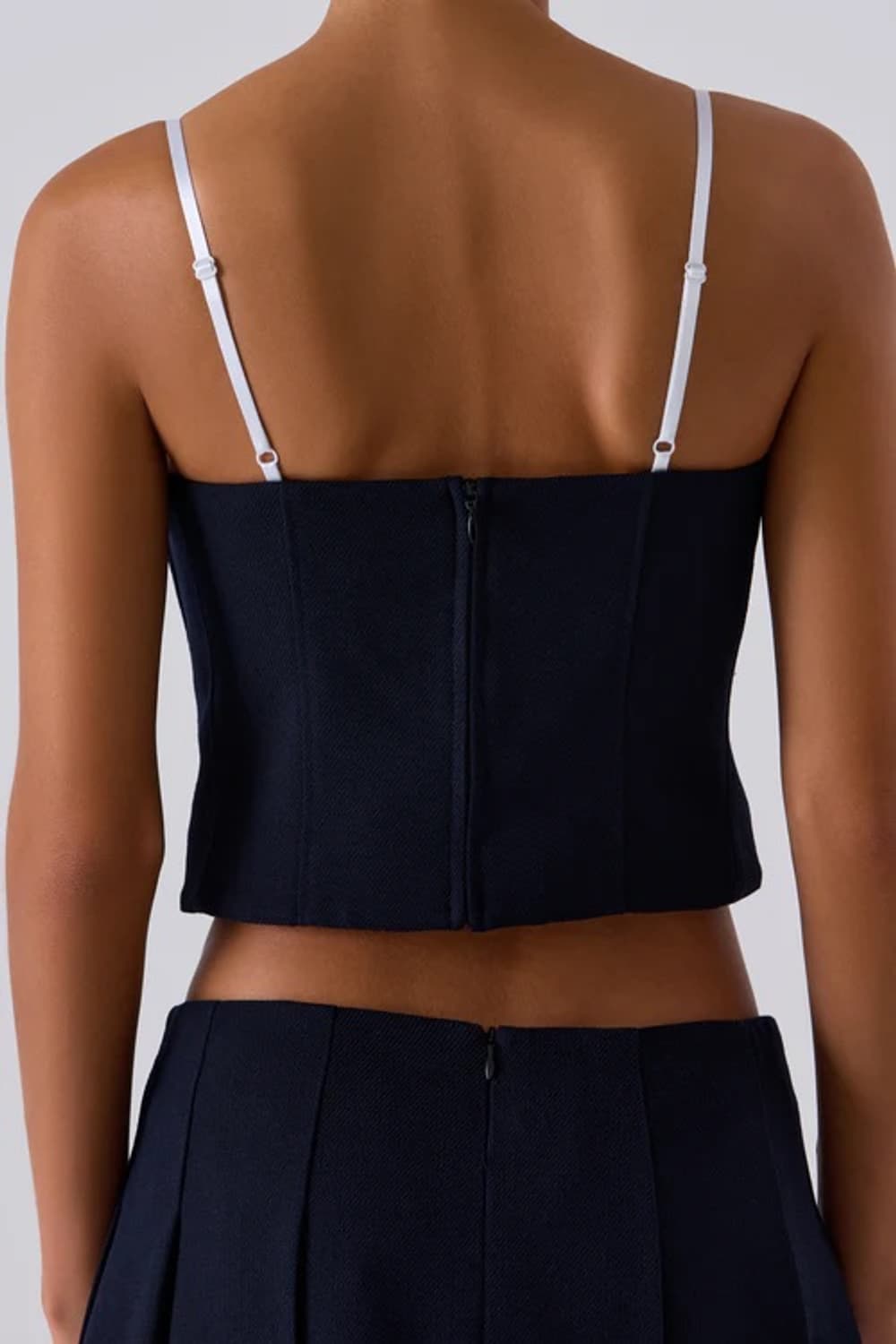 [6]슈슈통 25fw 더블 보우 레이어드 슬리브리스 탑/네이비 상품이미지3