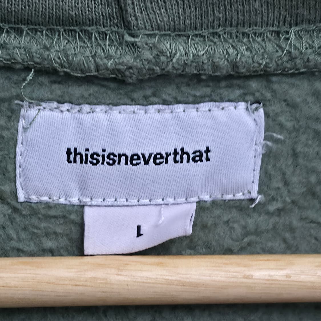 [L] 디스이즈네버댓 카키 후드티 상품이미지6