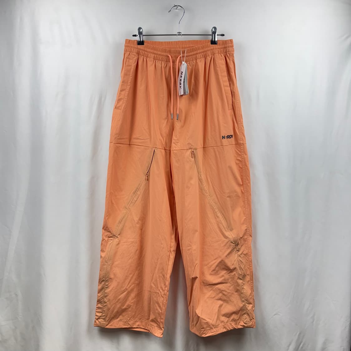 (새상품)(M) 널디 컨실 지퍼 우븐팬츠 라이트오렌지 상품이미지2