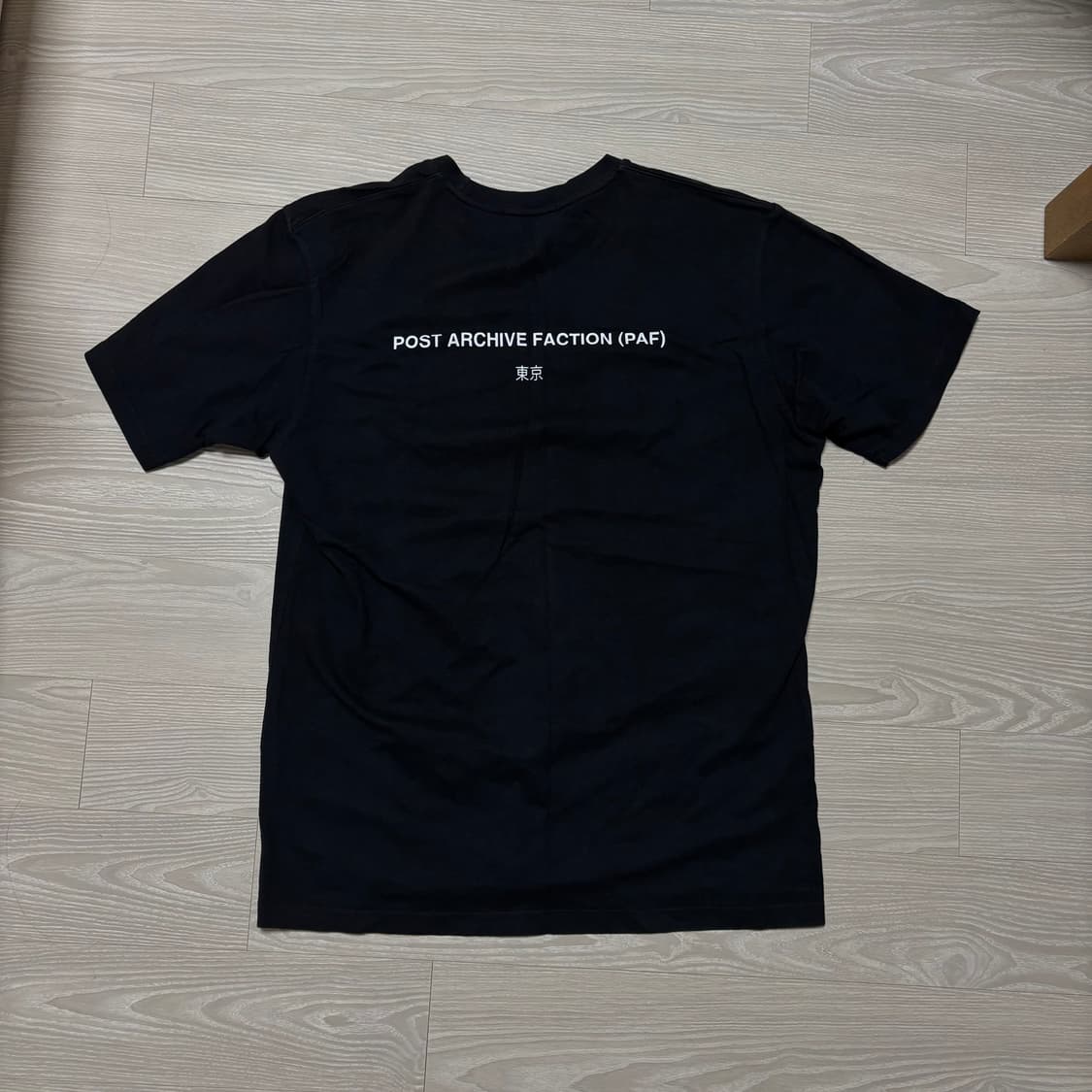 포스트아카이브팩션 헬리녹스 도쿄 팝업 티셔츠 상품이미지1