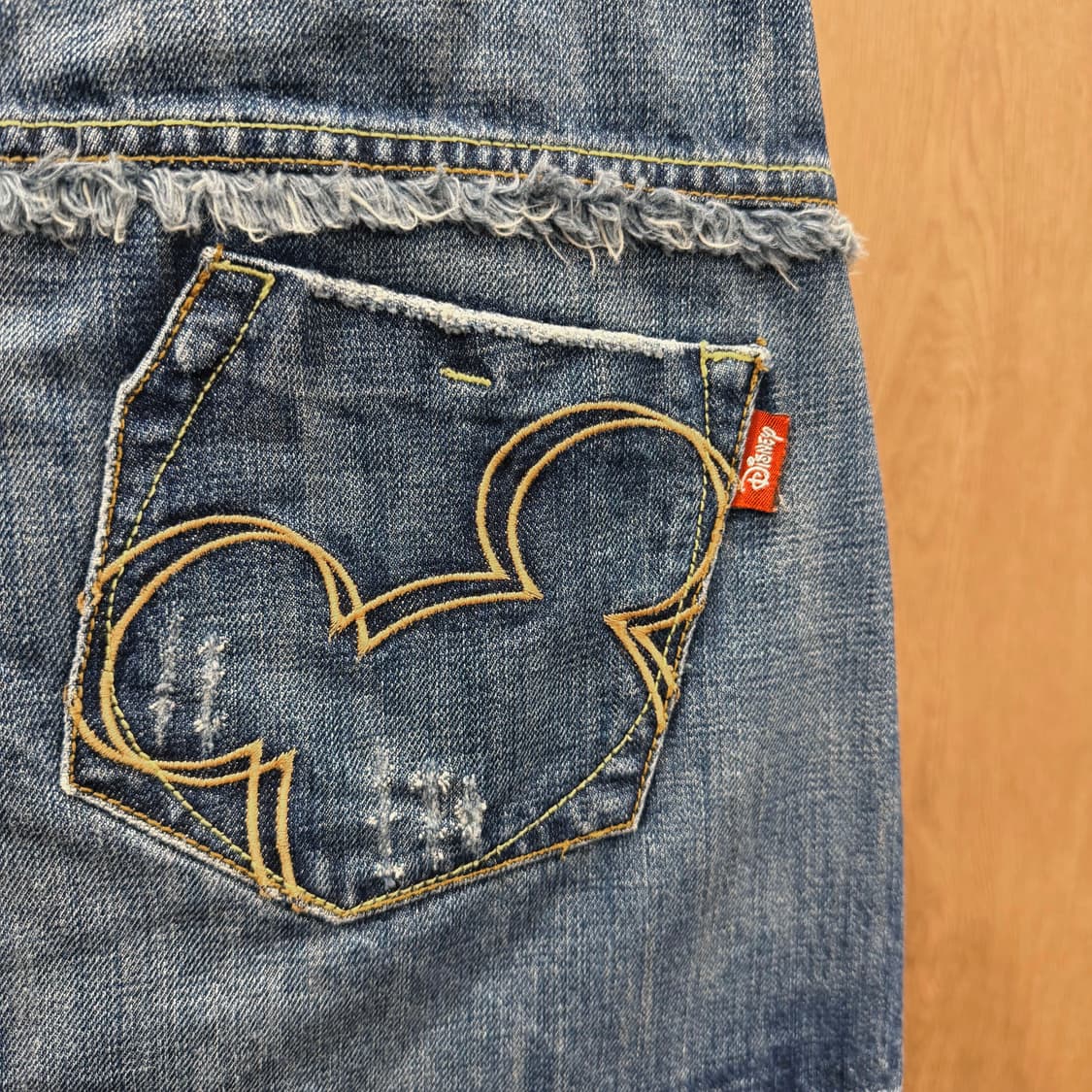 디즈니 진스 데님 미니 스커트 미키 프린팅 밑단 프린지 디테일 중청 상품이미지7