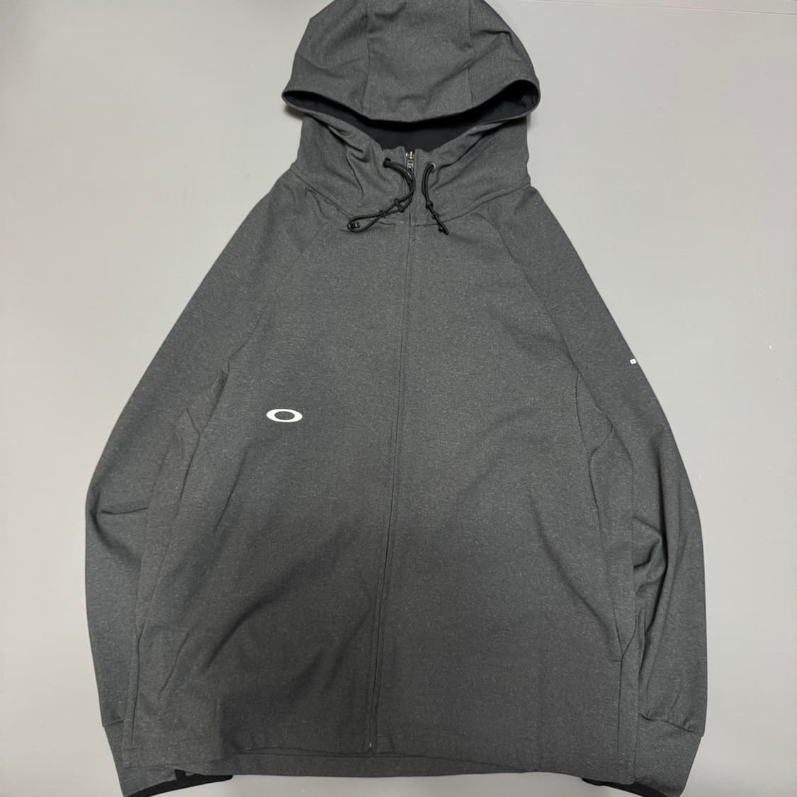 오클리(OAKLEY) 차콜컬러 인핸스 그리드 폴리에스터 후드 윈드브레이커 상품이미지7