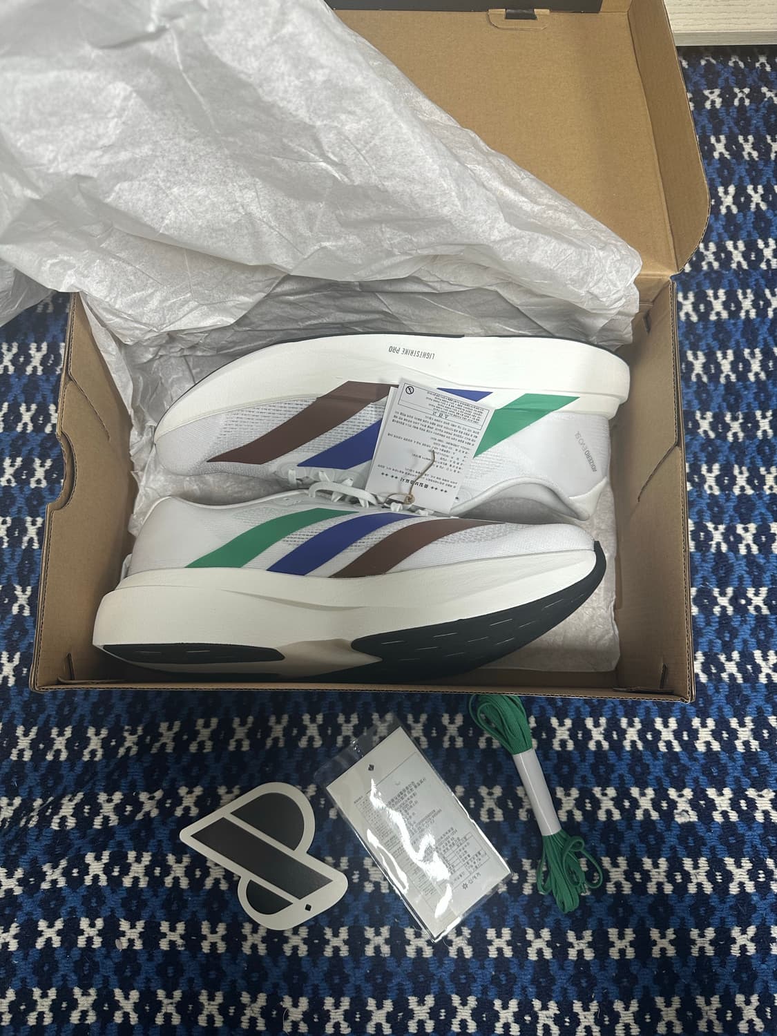 아디다스 x 퍼렐 윌리엄스 휴먼레이스 아디제로 아디오스 EVO SL 상품이미지1