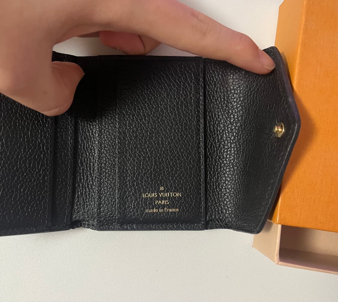 루이비통 앙프렝뜨 조에월릿 반지갑 상품이미지7