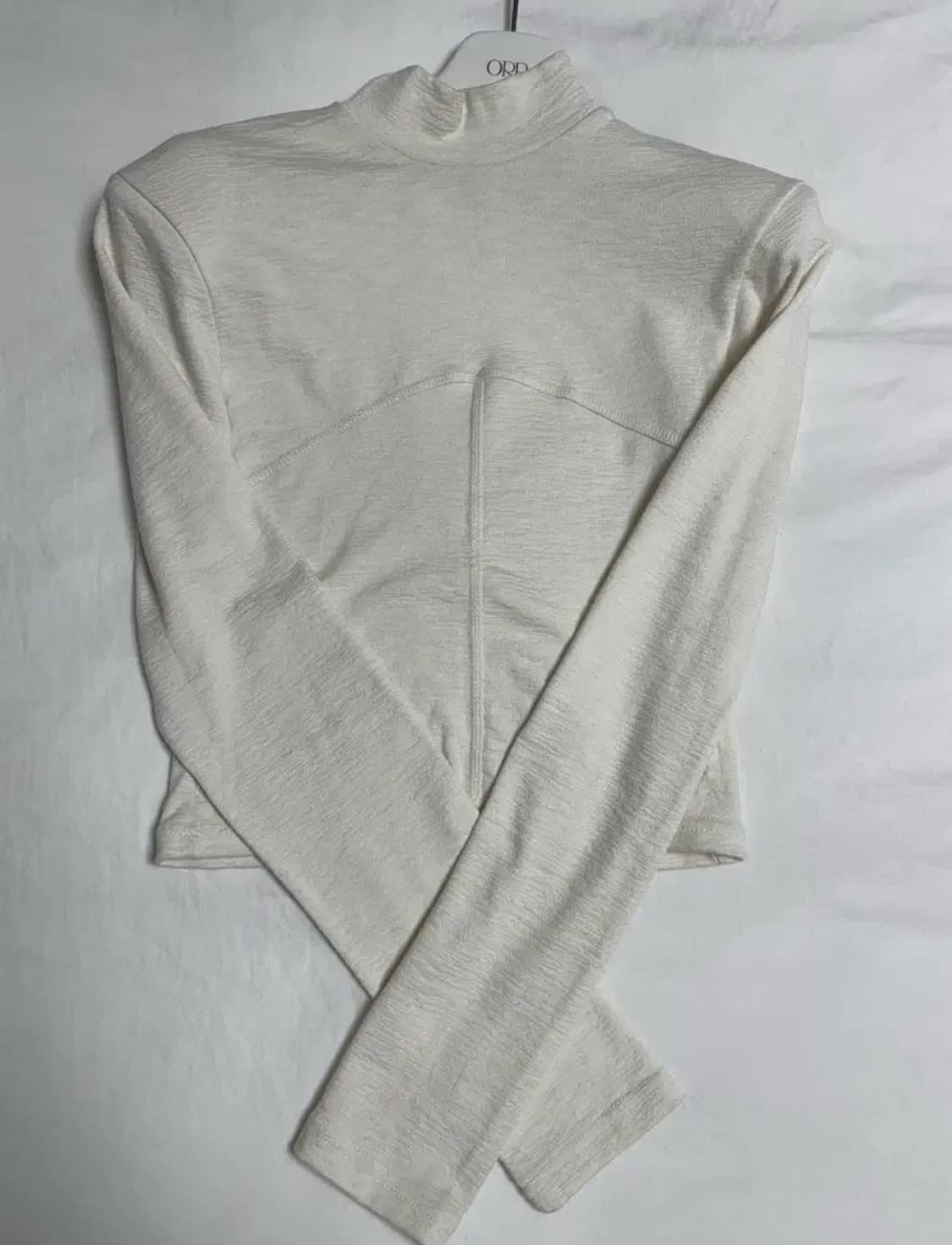 탑드레싱 클로즈 폴라 티 - 아이보리 상품이미지1