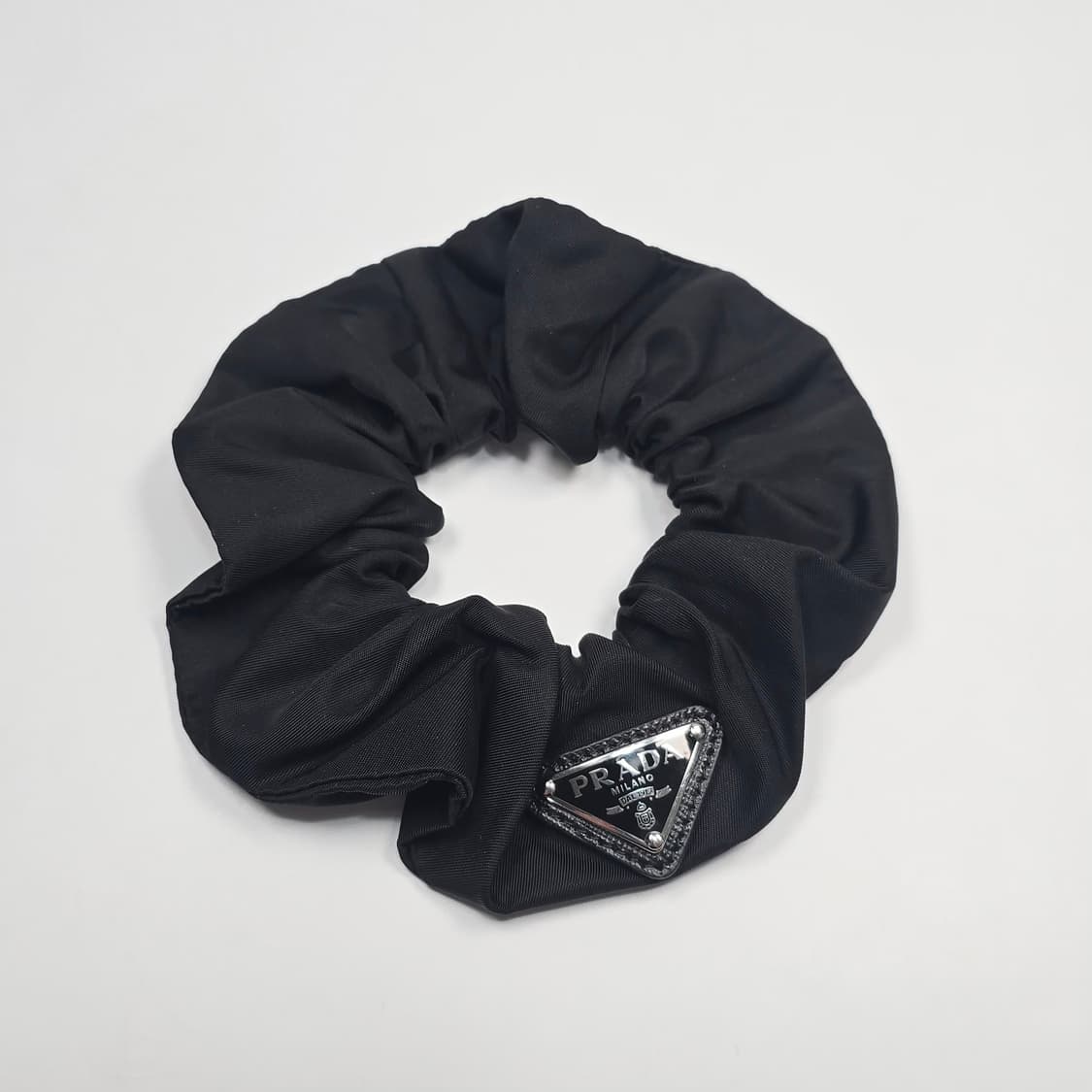 프라다 트라이앵글 로고 리나일론 헤어 밴드 상품이미지1