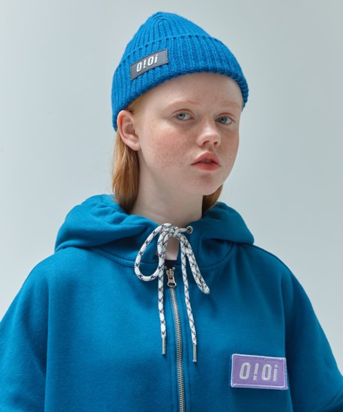 OIOI 로고 포인트 후드집업 덕 블루 상품이미지1