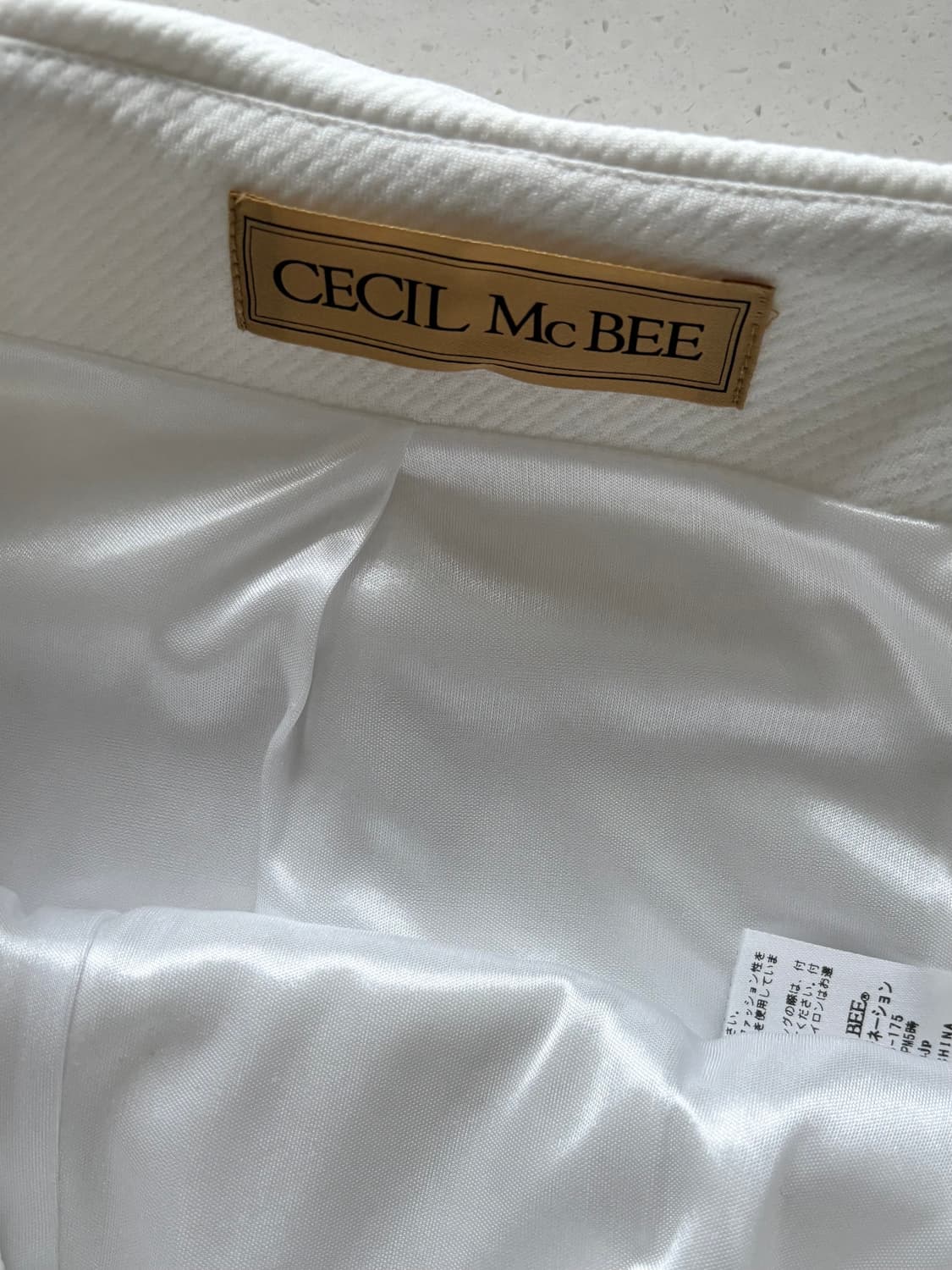 cecil mcbee 세실맥비 큐빅 버튼 오네갸루 스커트 상품이미지3